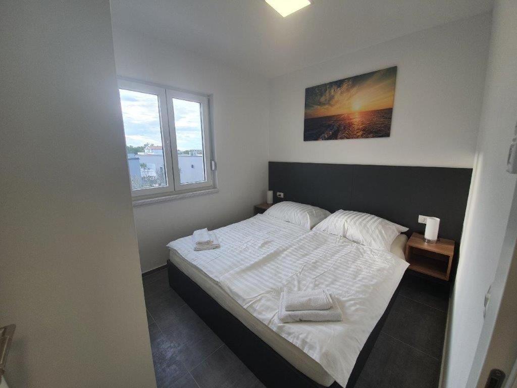 V Apartman Vir