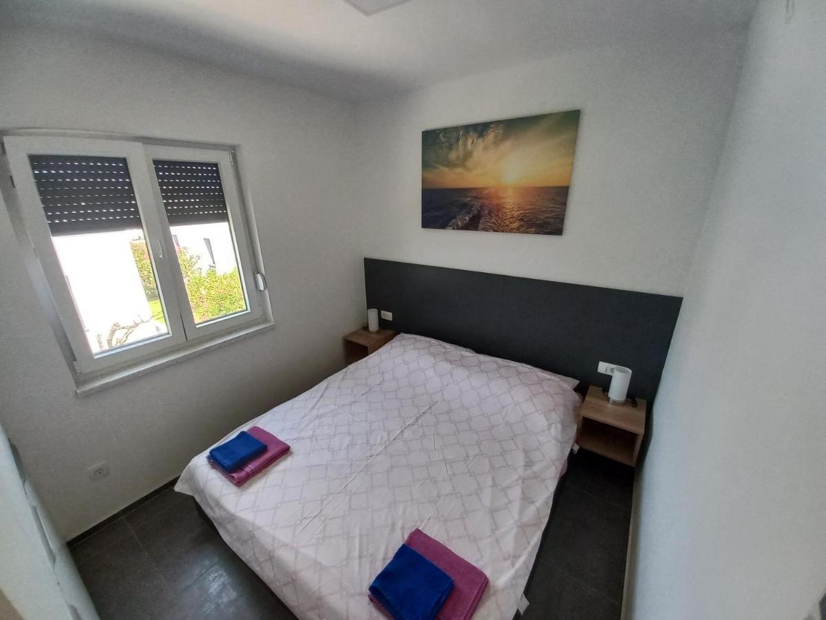 V Apartman Vir